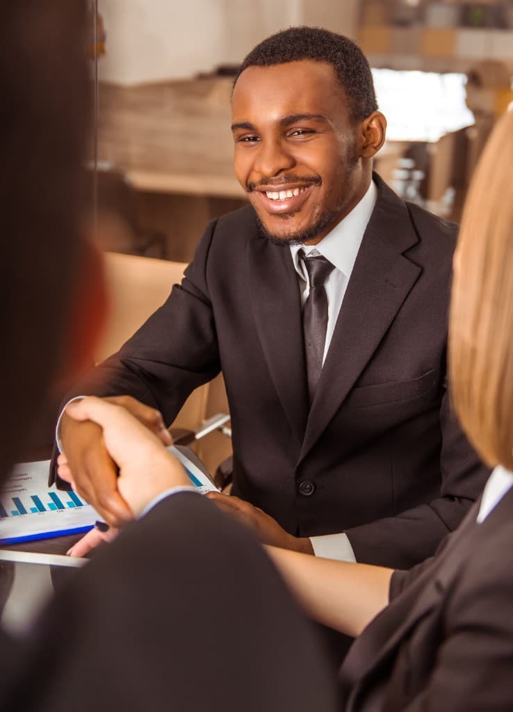 Banking professionals reviewing cross-border settlement workflows